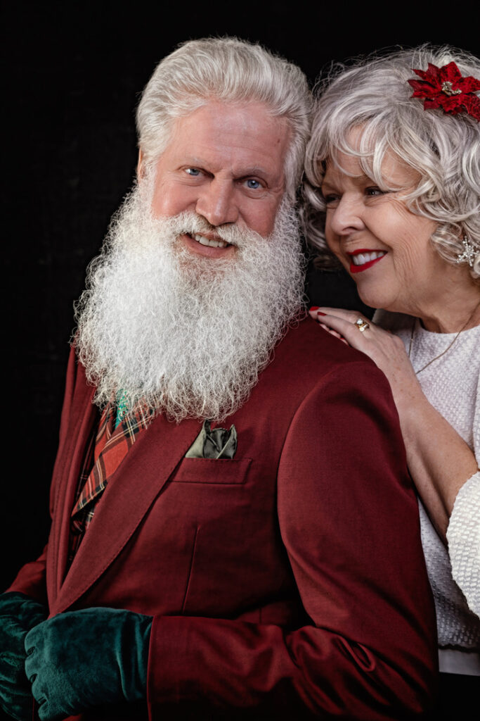 Santa Boe and Mrs. Claus from St. Paul and Minneapolis, Minnesota or Twin Cities metro area as modern, trendy, and GQ Clauses.