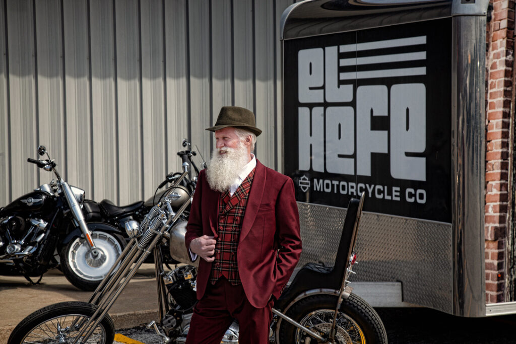 Santa Boe from St. Paul and Minneapolis, Minnesota or Twin Cities metro area as a modern, trendy, hipster, tailored GQ Santa Claus.