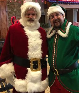 Minnesota's Santa Boe meets up with Santa's Elf to spread cheer for all to hear